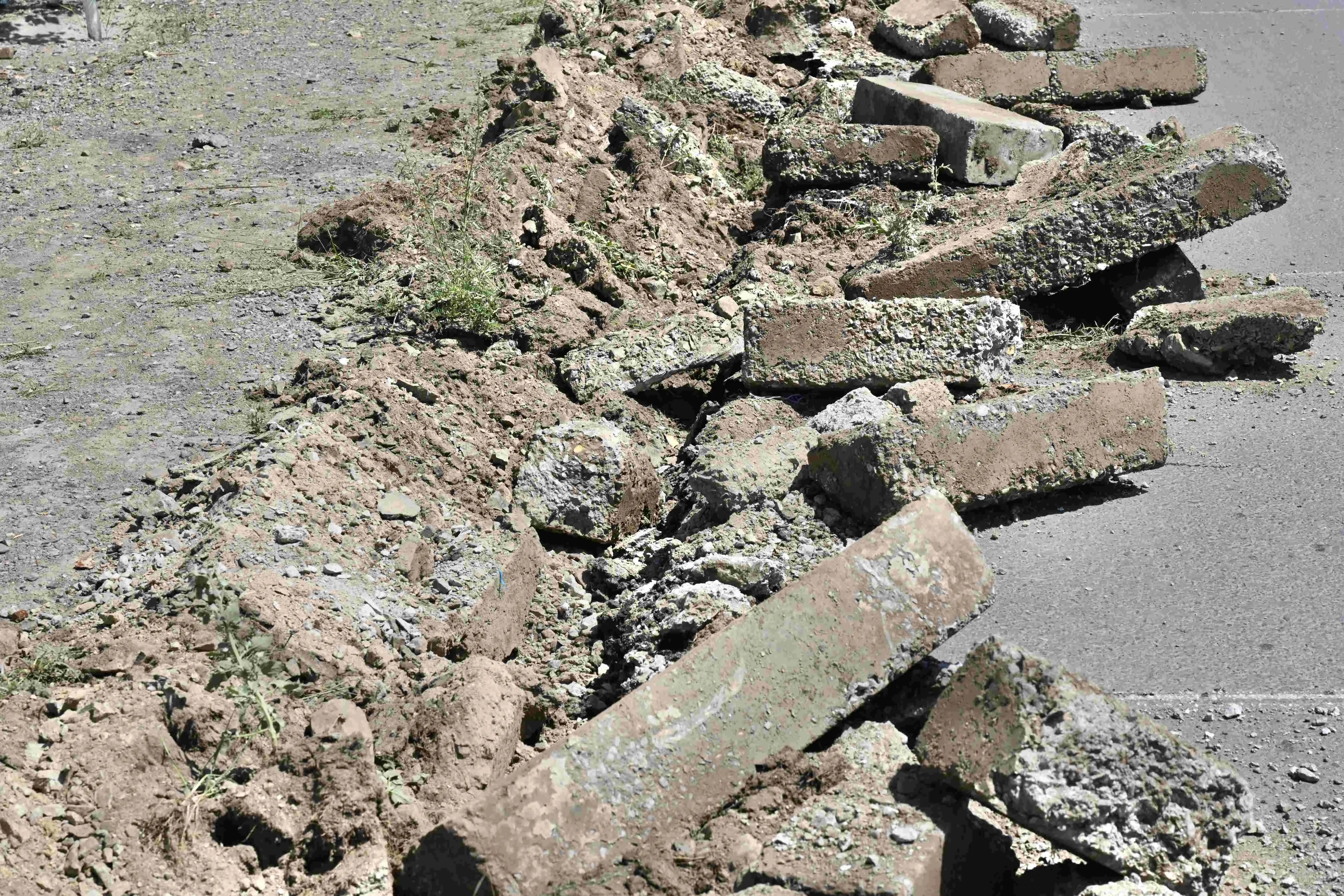 The 14-year-old road curb is being replaced with a natural stone curb